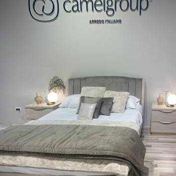 Double bed and bedside tables by Camel Group