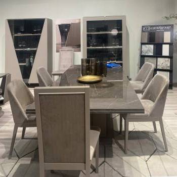 Table, chairs, and display cabinets by Camel Group